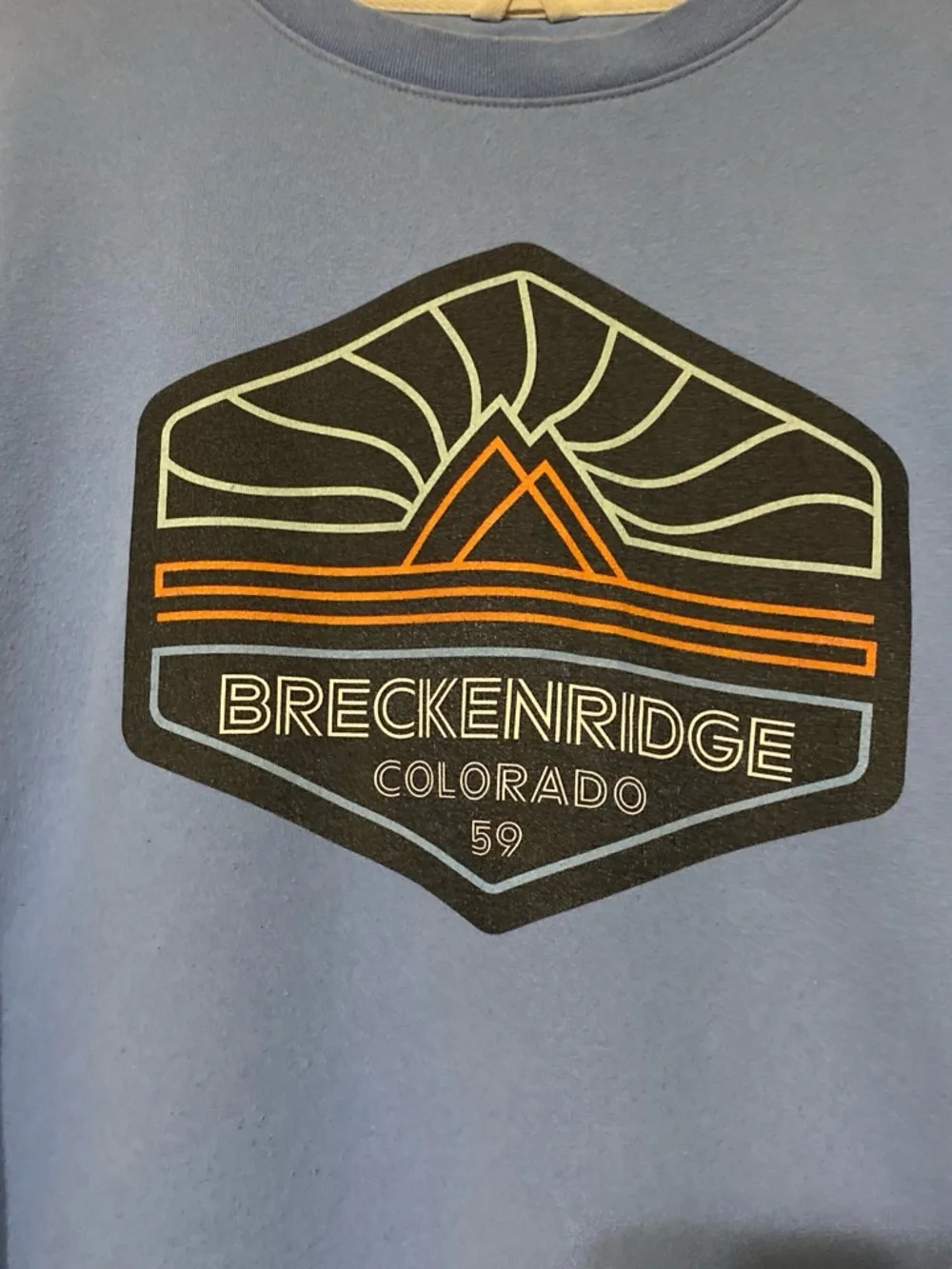 breckenridge light blue crewneck with mountain badge